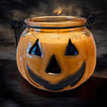 Jack-o-lantern pumpkin candle orange glass