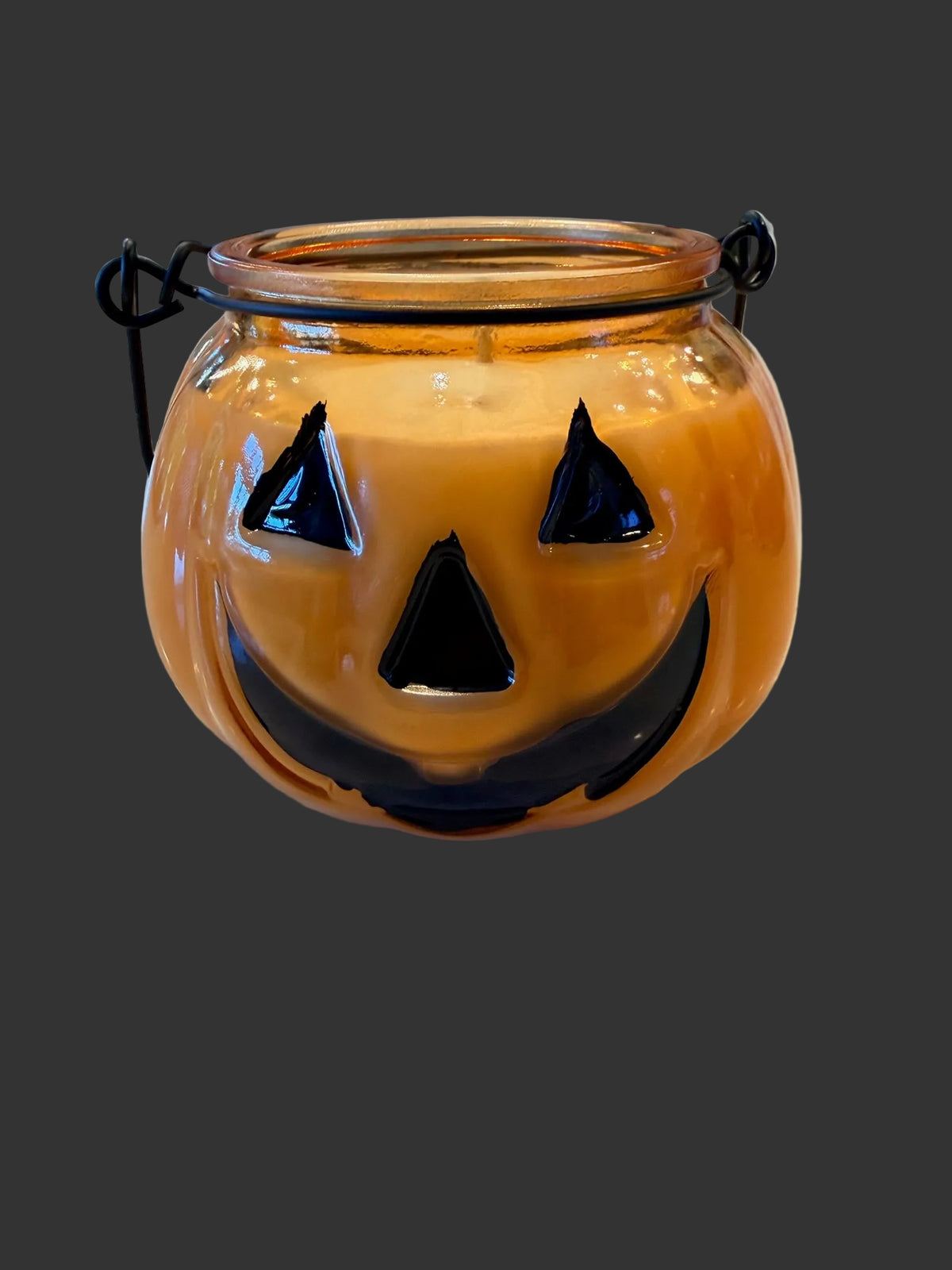Jack-o-lantern pumpkin candle orange glass